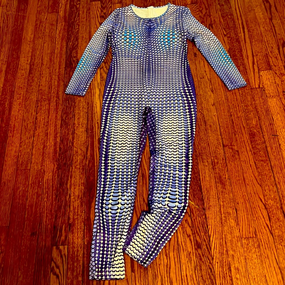 Love the vibrant colors in this body suit and it fits like a glove.